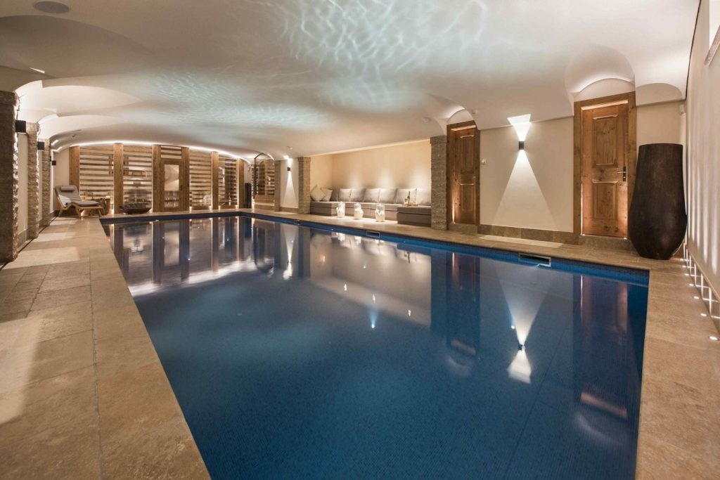 The marvellous indoor pool at Chalet Chouqui is one of the biggest in all of Verbiers luxury ski chalets