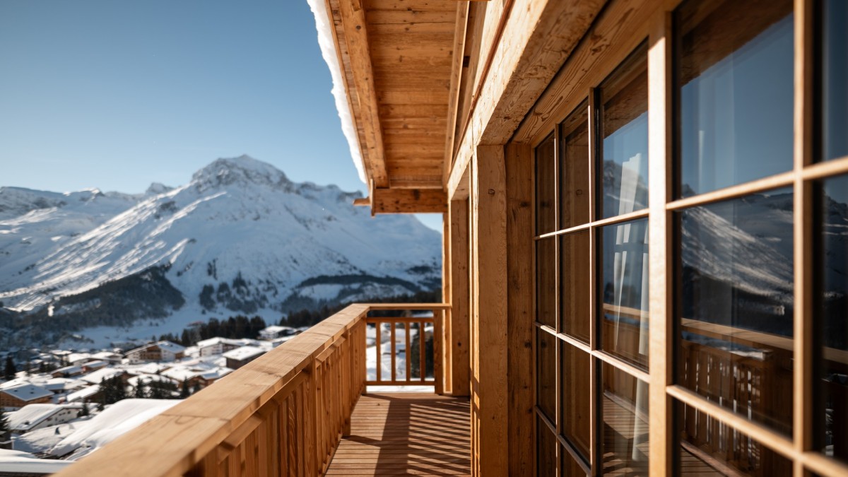 From numerous balconies of Chalet The Barn, guests can enjoy breathtaking views across Lech's winter wonderland