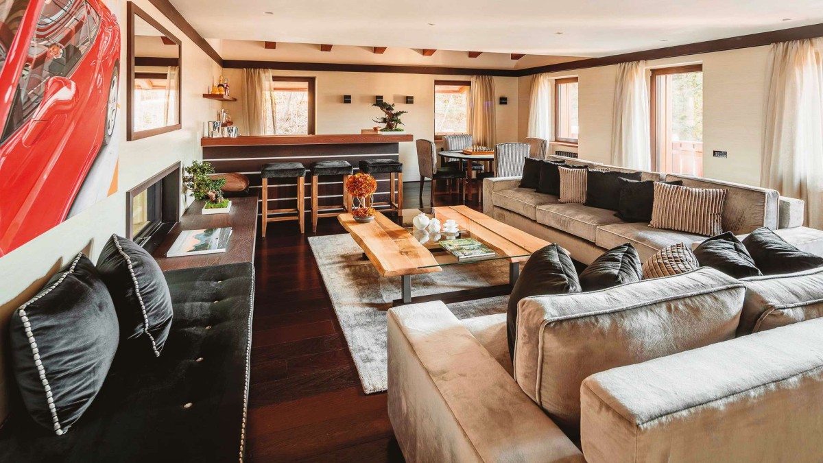 Chalet Perla – the living area with several comfy sofas Chalet Perla – the living area with several comfy sofas