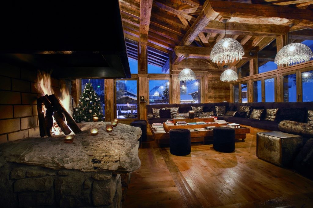 Luxury ski chalet Marco Polo, Val d’Isère – lounge area with open fireplace
