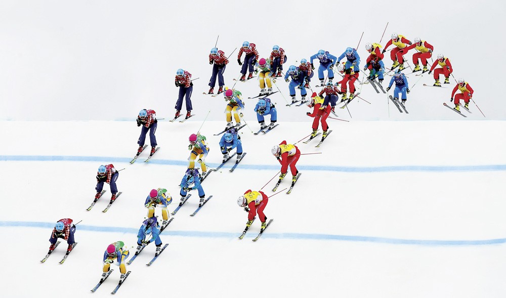 Sweden’s Holmlund, Canada’s Serwa, Austria’s Ofner and Switzerland’s Smith competes during women’s freestyle skiing skicross semi-finals at 2014 Sochi Winter Olympic Games in Rosa Khutor,Photo © LUCAS JACKSON/Reuters/Corbis