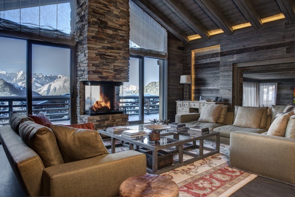 Chalet Aurora, Verbier – The living room with large floor to ceiling windows Chalet Aurora, Verbier – The living room with large floor to ceiling windows