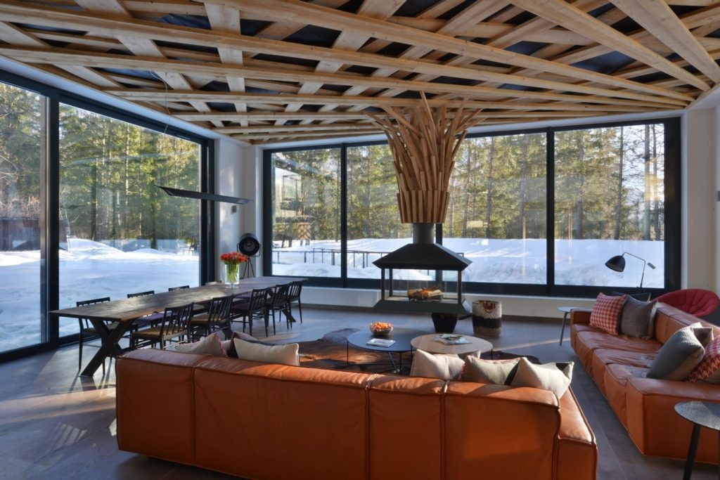 Living room with floor to ceiling windows at Chalet Dalmore