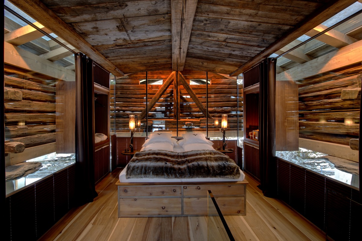 Backstage Luxury Loft in Zermatt – one of two bedrooms in the neighboring “authentic” chalet, accessible through an underground passage