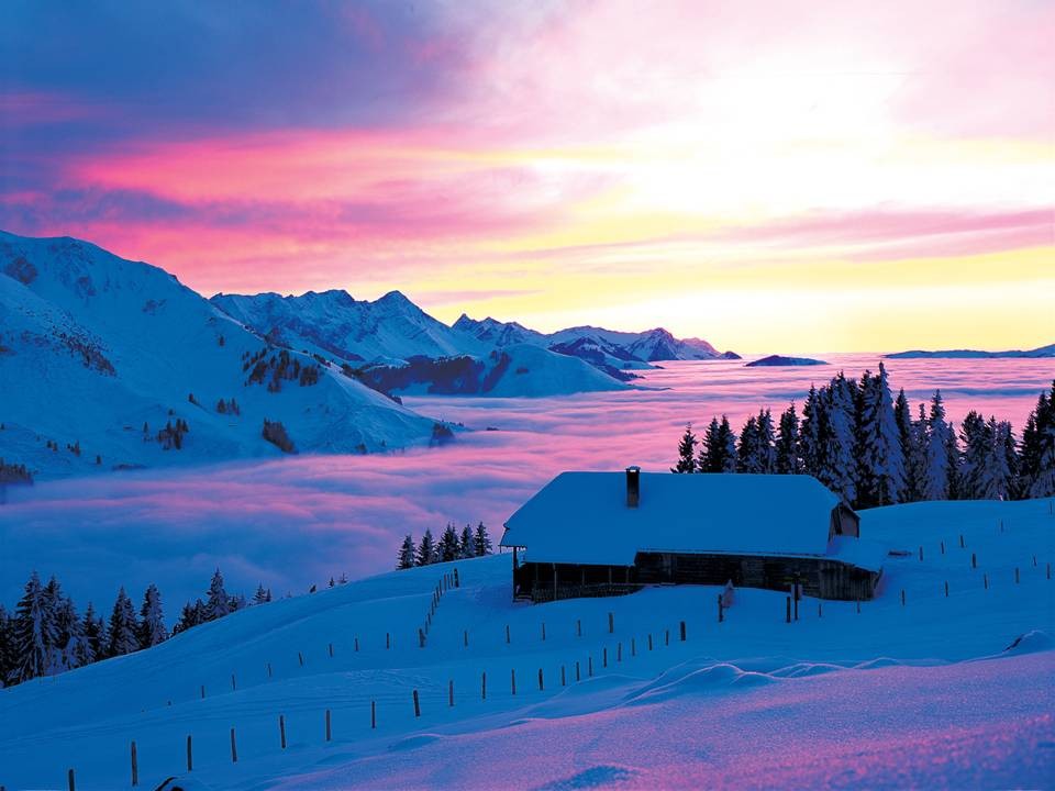 Dusk at Gurnigel in the Gantrisch Region, Canton Bern. View over the fog bank towards the Fribourg AlpsWe are happy to assist at any time to find your Luxury Ski Chalet worldwide for the perfect ski holidays